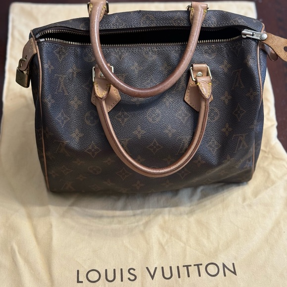 Louis Vuitton Brown Monogram Bag with Gold Lock - Picture 1 of 13